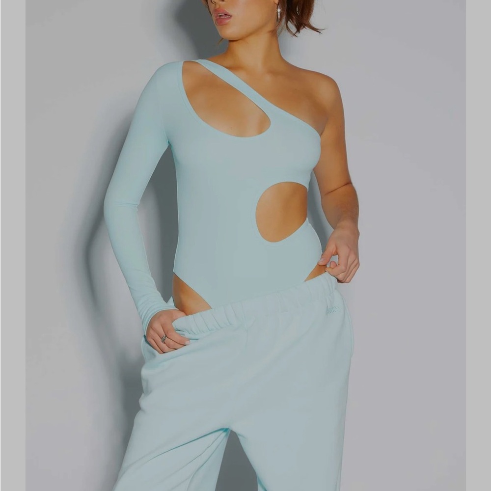 ELADAY Blue Asymmetrical Cut Out Bodysuit nwt medium